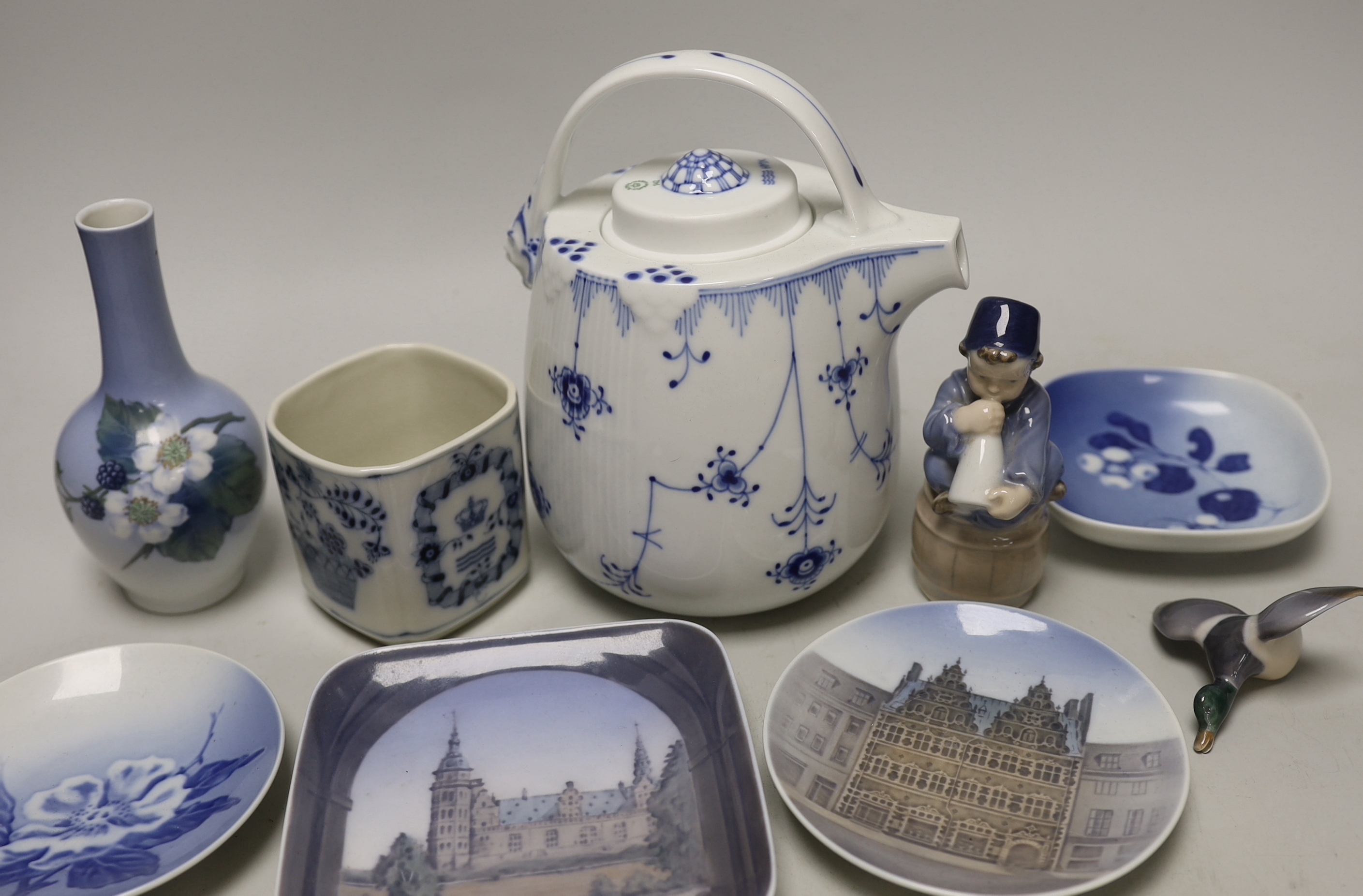 A group of Royal Copenhagen porcelain including an onion pattern teapot